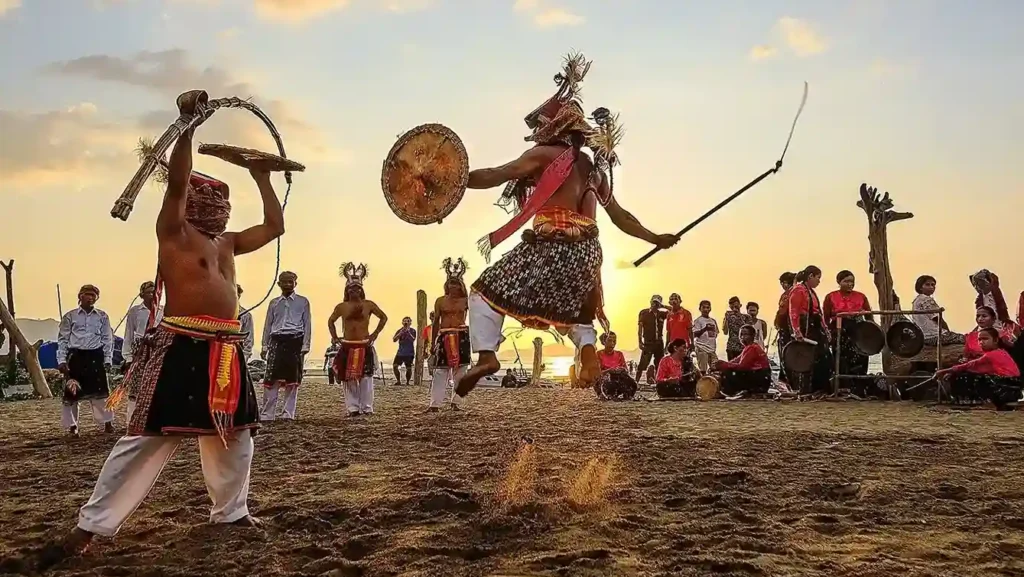 Tari Caci di Upacara Adat Penti (Source: Wikimedia Commons)